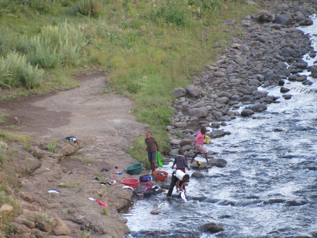 Locals washing clothes in the river
