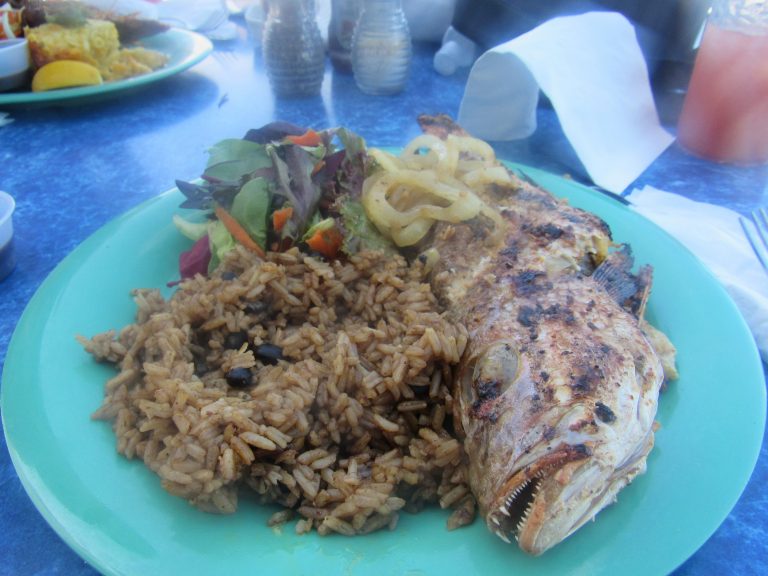 Grilled snapper with rice and peas